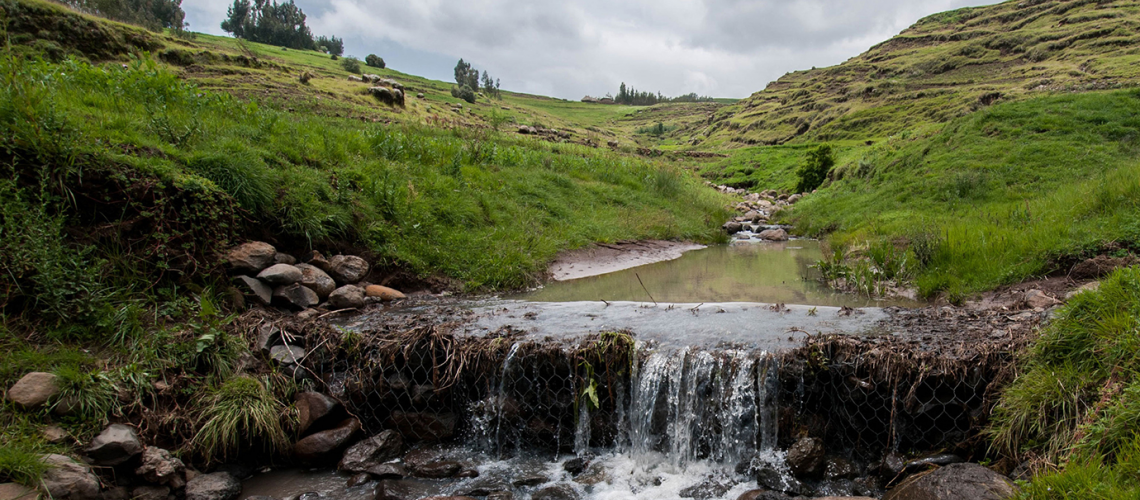 Water falling down a hill creek