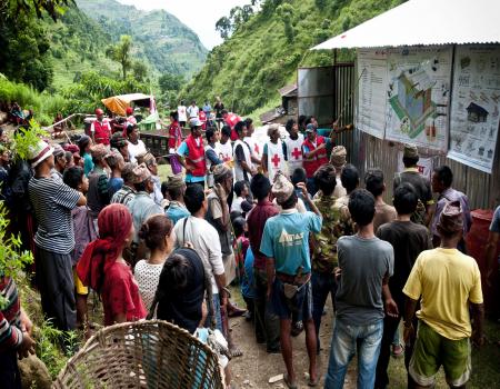 Crowd of people in a small village