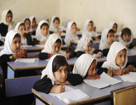 School girls sitting at their desks